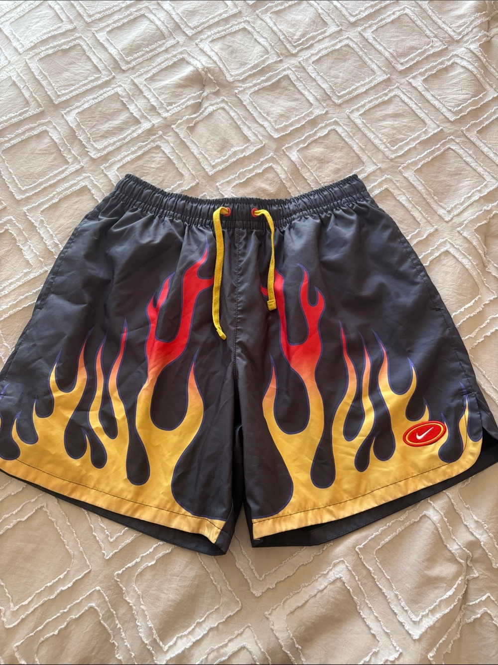 Nike Men’s Black Swim Board Shorts with Yellow and Red Flame Graphics